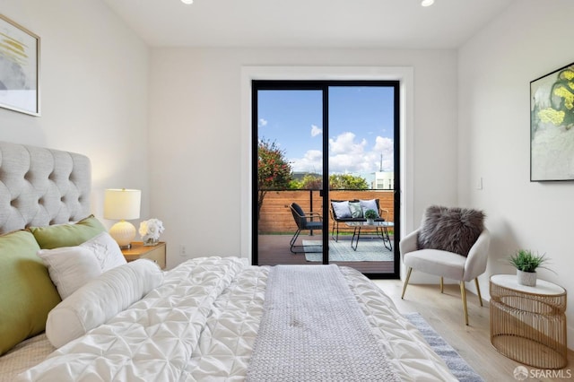 2287 45th Ave, San Francisco, CA 94116 - bedroom with access to outside, wood finished floors, and recessed lighting