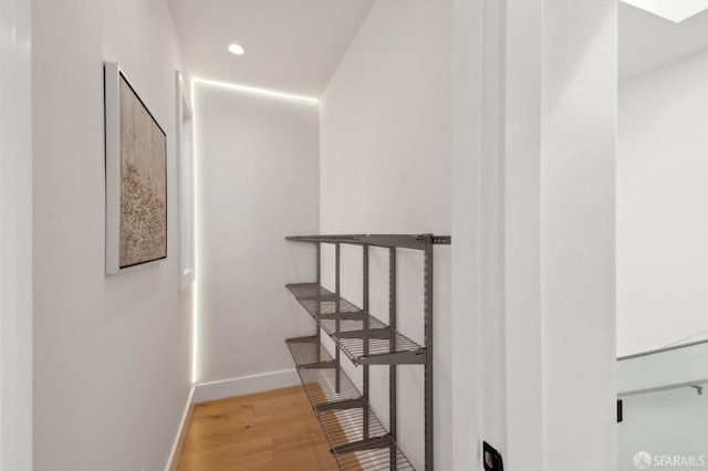 2287 45th Ave, San Francisco, CA 94116 - staircase with wood finished floors, recessed lighting, and baseboards