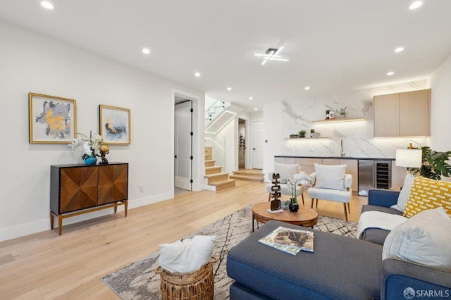 2287 45th Ave, San Francisco, CA 94116 - living area featuring beverage cooler, wet bar, light wood-style floors, stairs, and recessed lighting