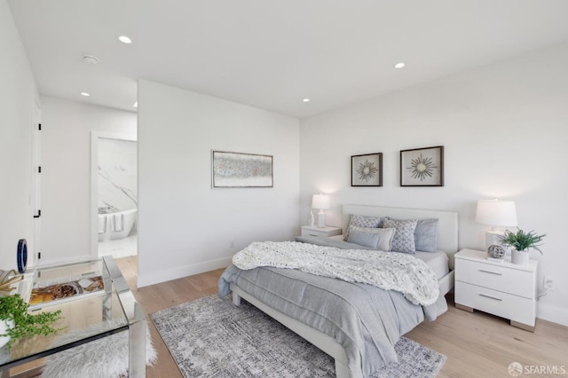 2287 45th Ave, San Francisco, CA 94116 - bedroom with light wood-style flooring, baseboards, recessed lighting, and ensuite bath