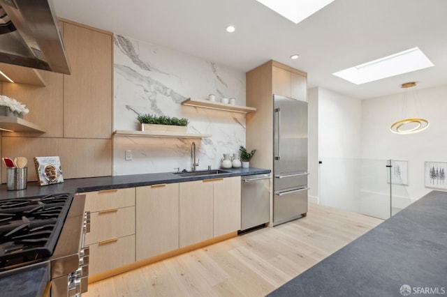 2287 45th Ave, San Francisco, CA 94116 - kitchen with open shelves, a skylight, a sink, appliances with stainless steel finishes, and light brown cabinetry