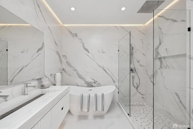 2287 45th Ave, San Francisco, CA 94116 - bathroom featuring a freestanding tub, a marble finish shower, vanity, recessed lighting, and marble tiled floors