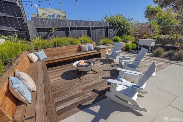 view of patio / terrace featuring a fire pit