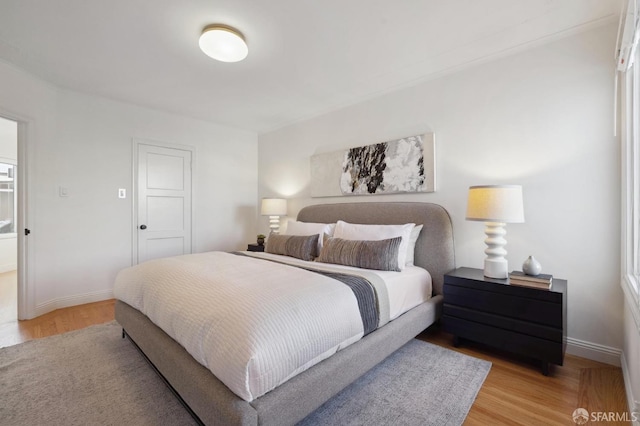 bedroom featuring light hardwood / wood-style flooring