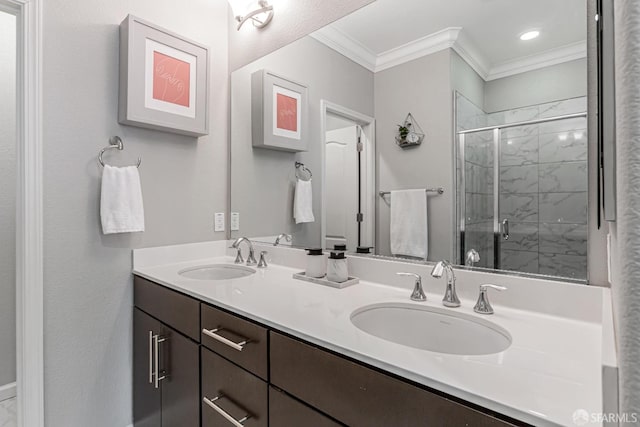 bathroom featuring an enclosed shower, crown molding, and vanity