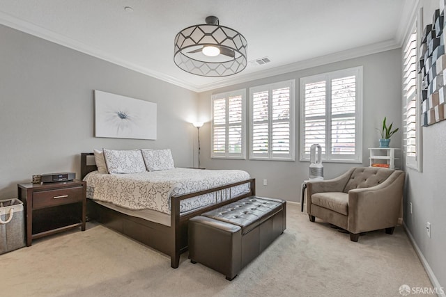 bedroom featuring crown molding and light colored carpet