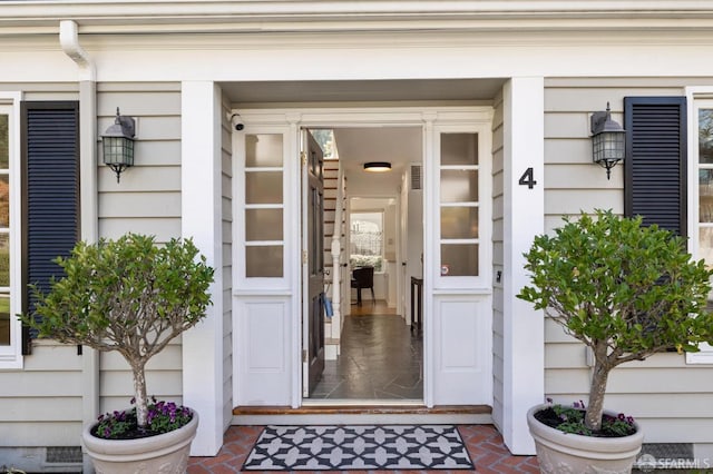 view of exterior entry featuring crawl space