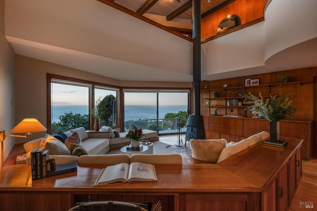 272 Ocean Pkwy, Bolinas, CA 94924 - living room featuring a wood stove, wood finished floors, a water view, and wooden ceiling