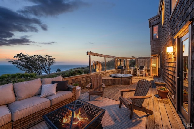 272 Ocean Pkwy, Bolinas, CA 94924 - wooden terrace with an outdoor living space with a fire pit and a water view