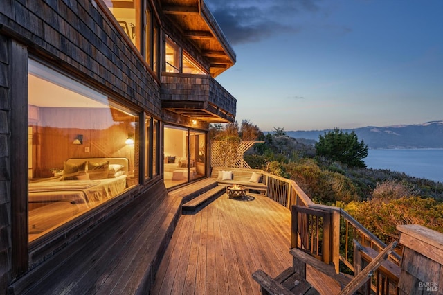 272 Ocean Pkwy, Bolinas, CA 94924 - deck with an outdoor fire pit and a water and mountain view