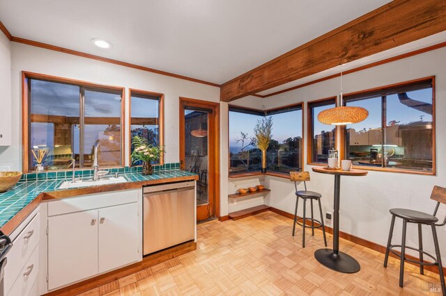 272 Ocean Pkwy, Bolinas, CA 94924 - kitchen with dishwasher, tile countertops, white cabinetry, crown molding, and recessed lighting