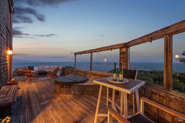 272 Ocean Pkwy, Bolinas, CA 94924 - deck at dusk with an outdoor living space and a water view