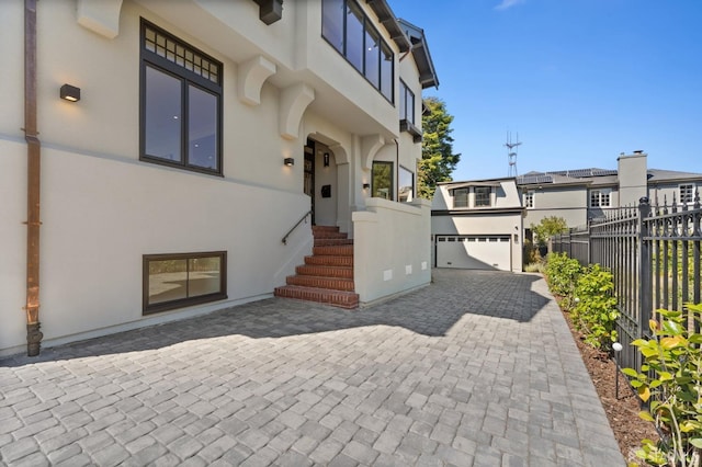 entrance to property featuring a garage