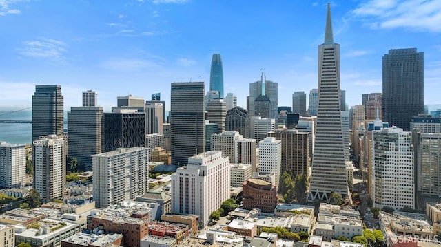 property's view of city with a water view