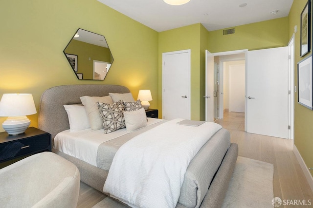 bedroom featuring light hardwood / wood-style flooring