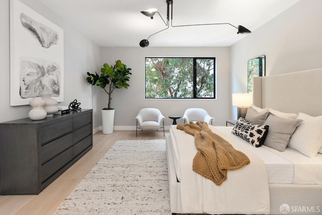 bedroom featuring light wood-type flooring