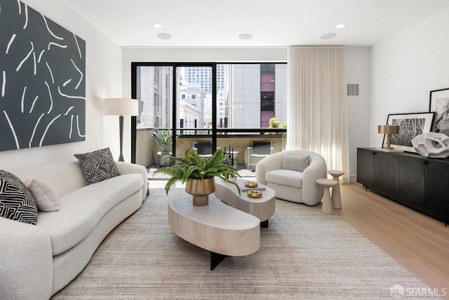 living room with hardwood / wood-style floors