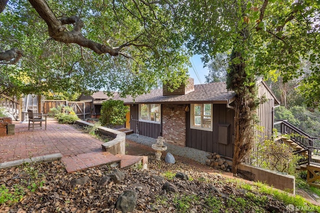 rear view of house with a patio area