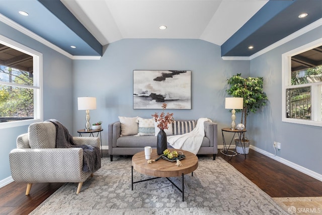 sitting room with vaulted ceiling, ornamental molding, and hardwood / wood-style floors