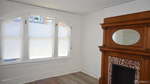 interior space featuring a healthy amount of sunlight and dark wood finished floors