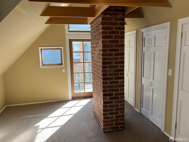 bonus room with vaulted ceiling with beams, carpet floors, and plenty of natural light