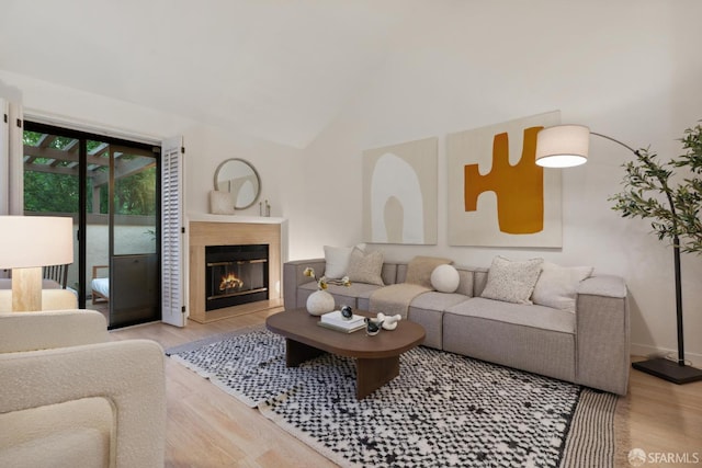 539 Pimlico Ct, Walnut Creek, CA 94597 - living area featuring wood finished floors, a premium fireplace, and lofted ceiling