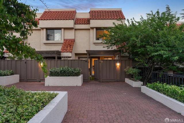 539 Pimlico Ct, Walnut Creek, CA 94597 - view of front of property featuring a tile roof, stucco siding, and a gate