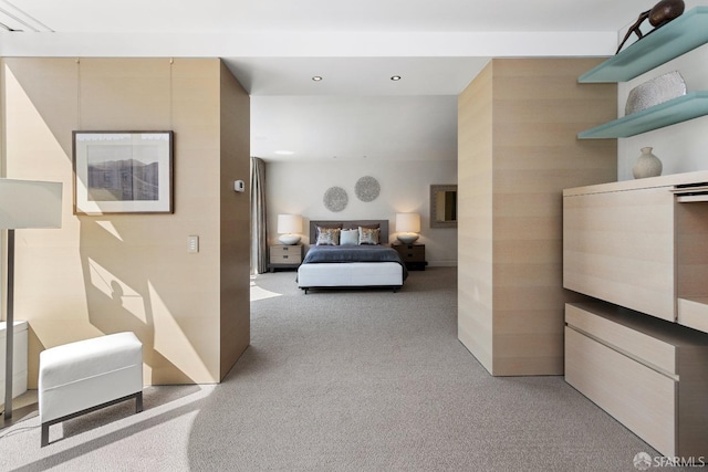 bedroom featuring light colored carpet