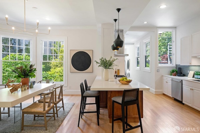 2864 Sacramento St, San Francisco, CA 94115 - dining space with baseboards, healthy amount of natural light, light wood-style flooring, recessed lighting, and ornamental molding