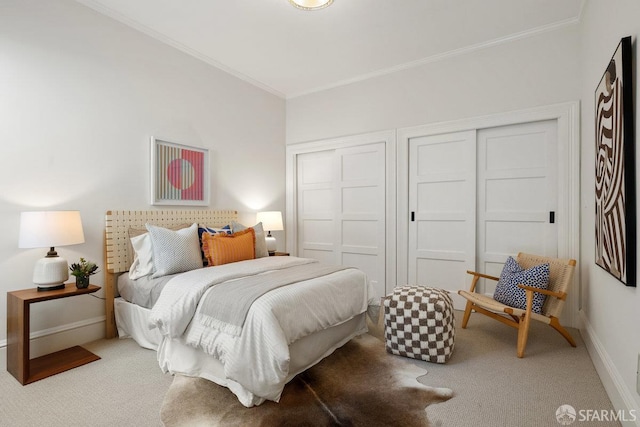 2864 Sacramento St, San Francisco, CA 94115 - carpeted bedroom featuring crown molding, baseboards, and multiple closets