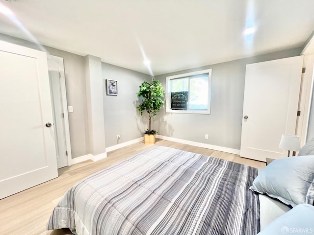 bedroom featuring light wood-type flooring