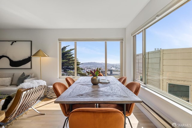75 Roosevelt Way Unit 1, San Francisco, CA 94114 - dining space with light wood-style floors, healthy amount of natural light, and a mountain view