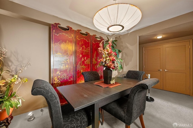 dining space with carpet floors