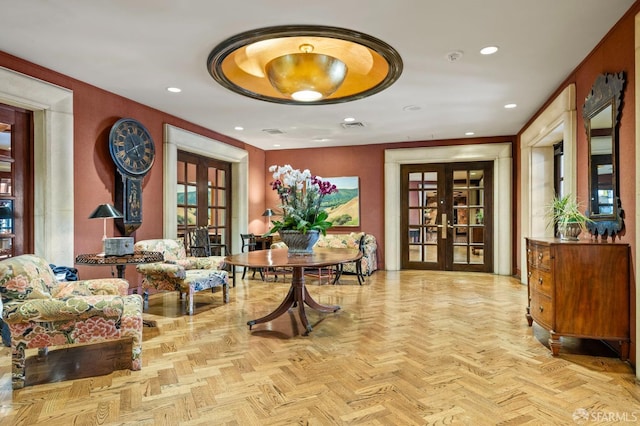 interior space featuring visible vents, recessed lighting, and french doors