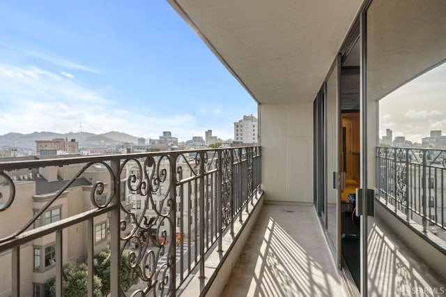 balcony featuring a city view