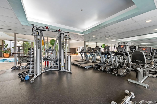 gym with a drop ceiling