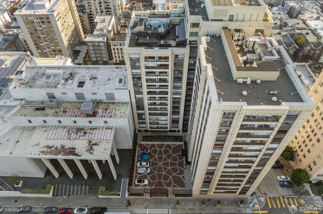 birds eye view of property featuring a view of city