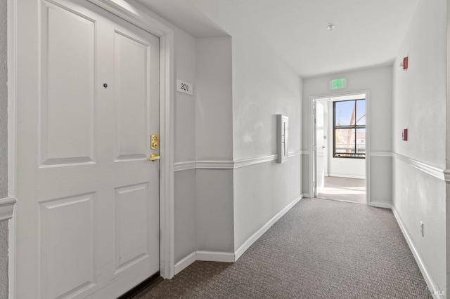 corridor featuring carpet flooring