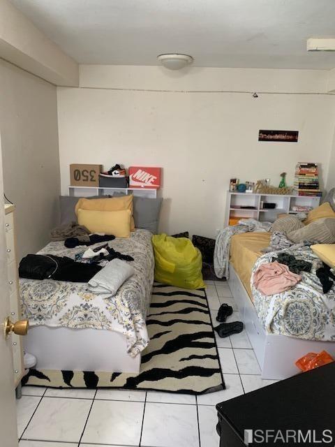 1326 Palou Ave, San Francisco, CA 94124 - bedroom with tile patterned flooring