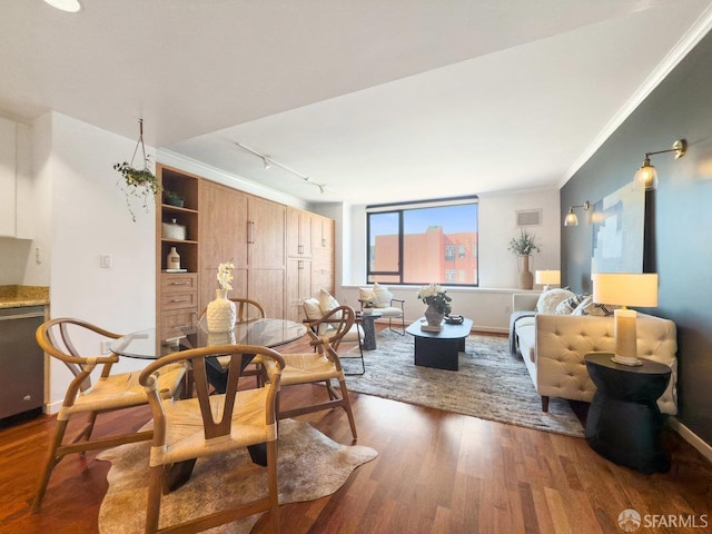 250 King St Unit 528, San Francisco, CA 94107 - dining area with visible vents, track lighting, crown molding, baseboards, and wood finished floors
