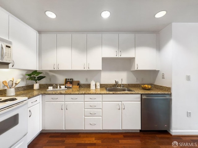 250 King St Unit 528, San Francisco, CA 94107 - kitchen featuring a sink, white appliances, recessed lighting, and white cabinetry