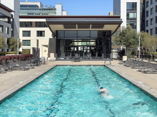 250 King St Unit 528, San Francisco, CA 94107 - view of swimming pool with a patio and fence