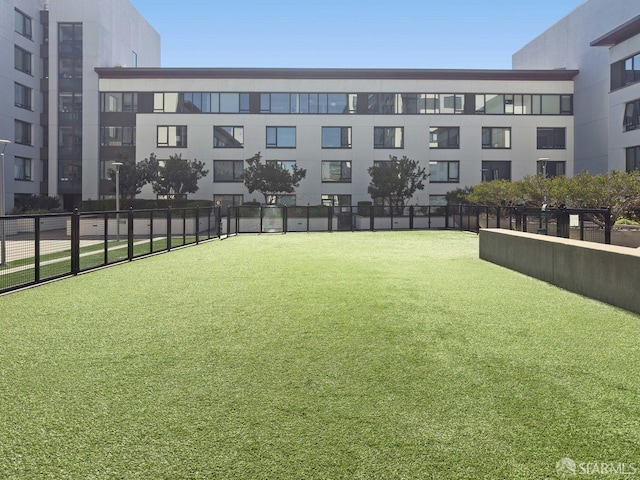 250 King St Unit 528, San Francisco, CA 94107 - surrounding community with a yard and fence