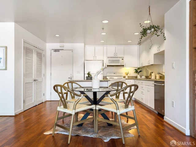 250 King St Unit 528, San Francisco, CA 94107 - dining room with dark wood-type flooring, recessed lighting, and baseboards