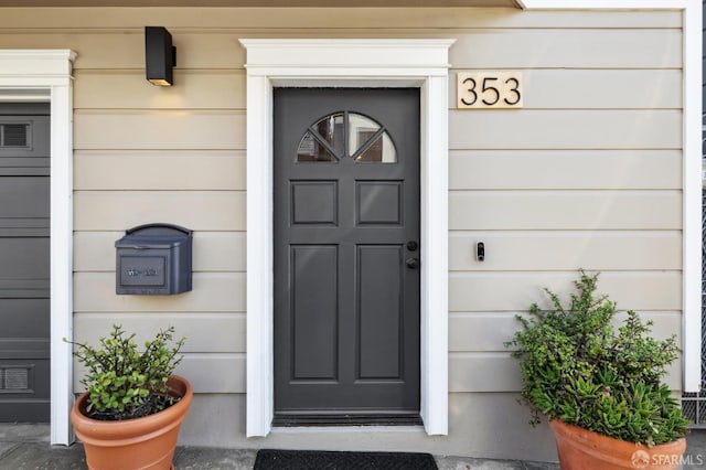 entrance to property featuring visible vents