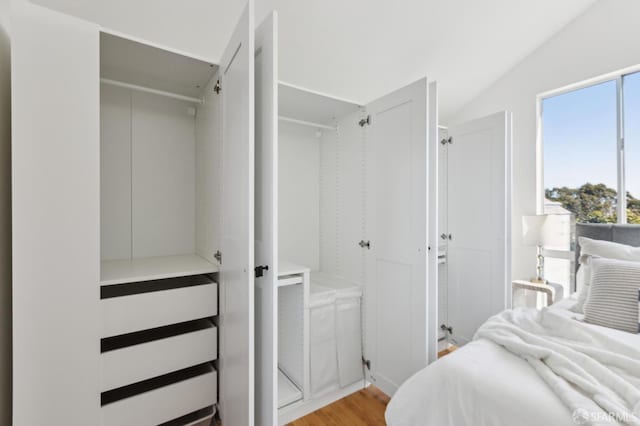 bedroom featuring light wood-style floors