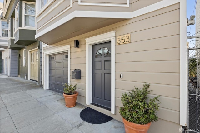 entrance to property with a garage