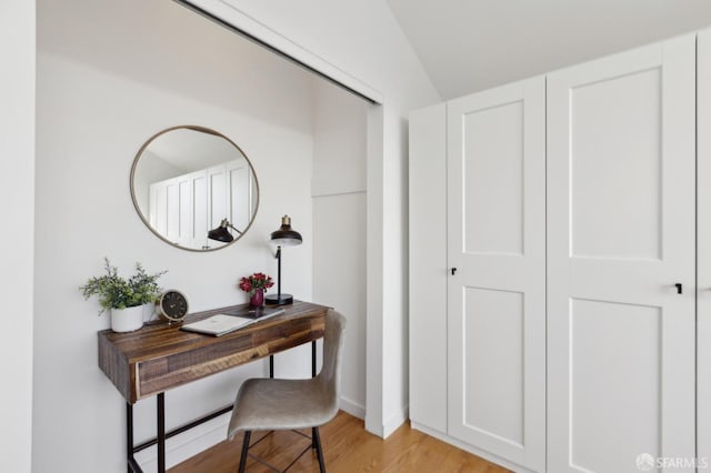 office space with light wood finished floors