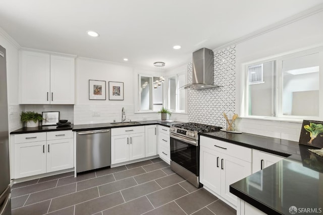 1944 15th Ave, San Francisco, CA 94116 - kitchen with appliances with stainless steel finishes, wall chimney range hood, a sink, ornamental molding, and dark countertops