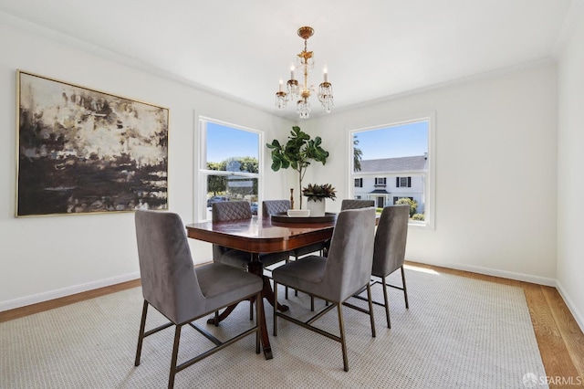 1944 15th Ave, San Francisco, CA 94116 - dining room featuring a chandelier, healthy amount of natural light, light wood-style floors, and baseboards